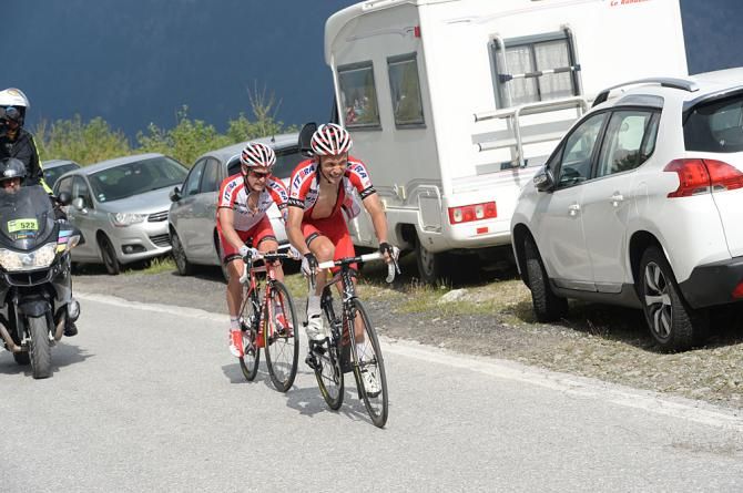 Katusha teammates Yury Trofimov and Egon Silin finish in second and third on the podium