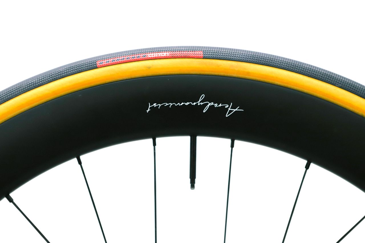 A tan bicycle tyre on a white background