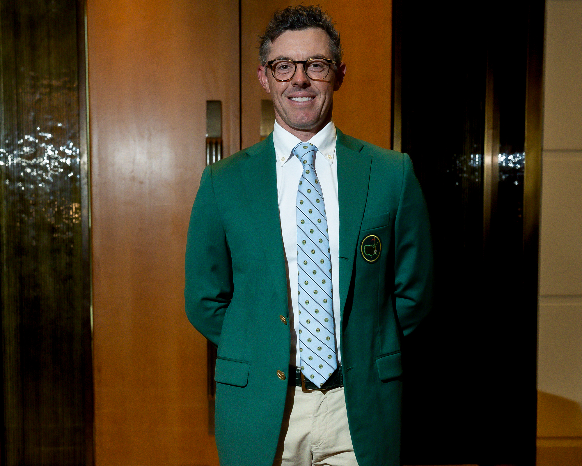 Rory McIlroy poses for a photo wearing the Green Jacket