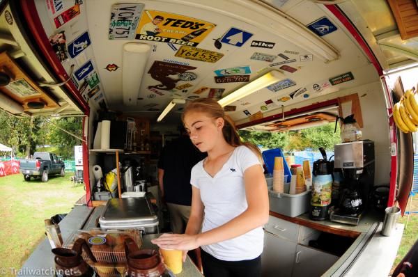 Julianna preparing drinks in the decorative coffee truck