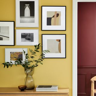 Yellow gallery wall