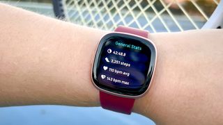 Fitbit Versa 4 showing completed workout stats