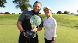 Who is Danielle Kang's caddie?