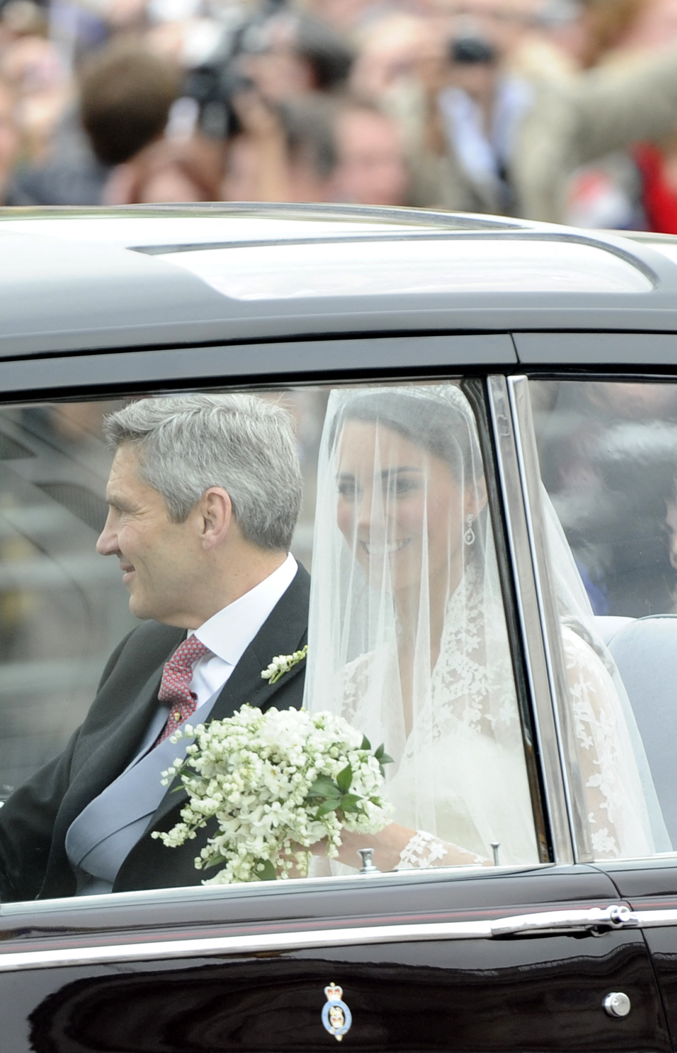 Kate Middleton travels in a Rolls Royce Phantom VI, accompanied by her father Michael Middleton to Westminster Abbey in London for her wedding to Britain's Prince William, on April 29, 2011