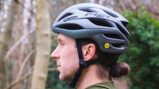 A rider's profile in the MET Estro MIPS helmet