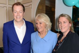 Camilla with her two children Tom and Laura at a press event