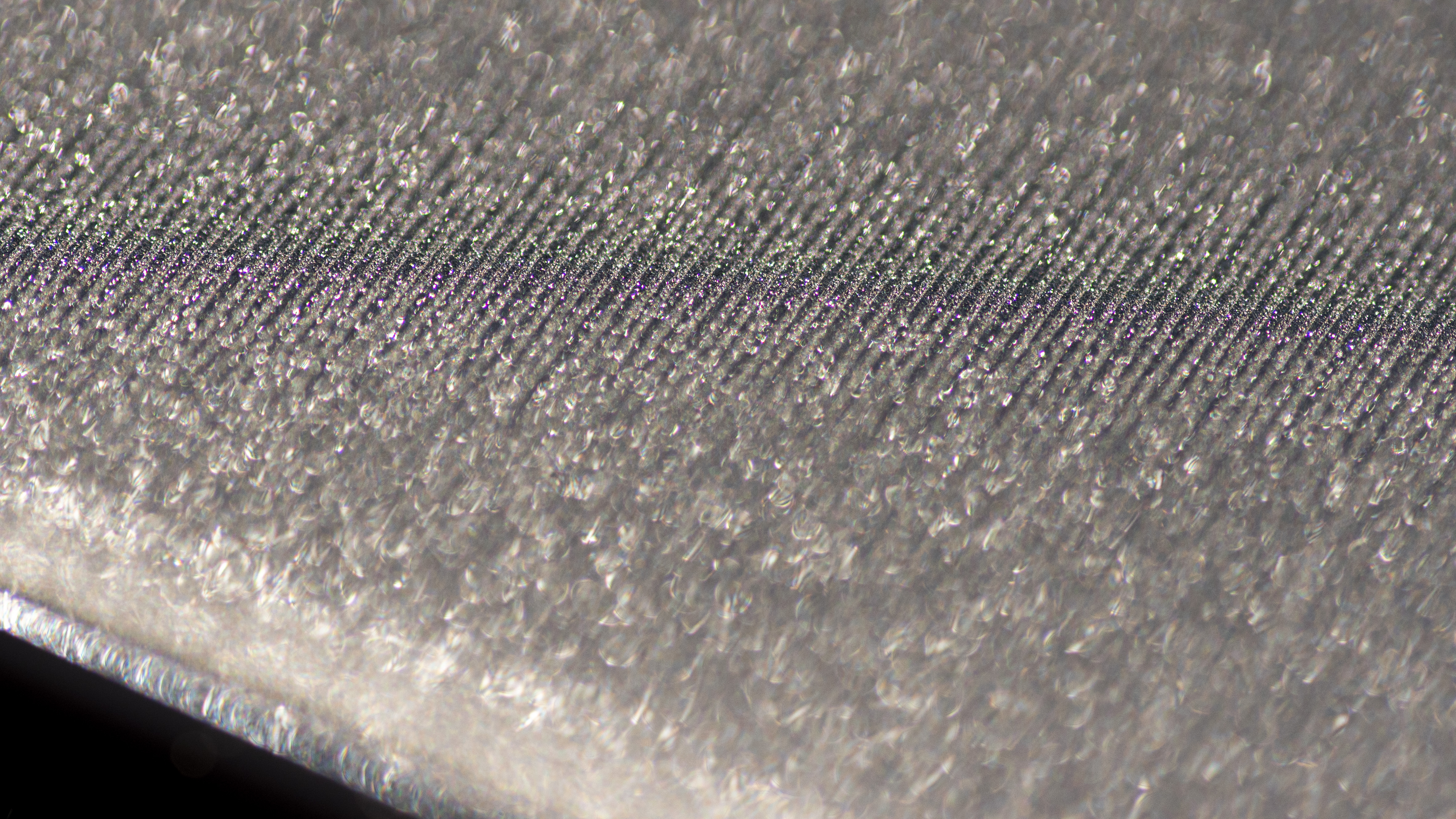 Macro image of the moonstone black color showing ripple texture