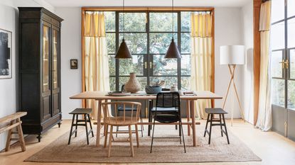 Dining room curtain ideas with modern rustic furniture and light linen curtains with a fold top