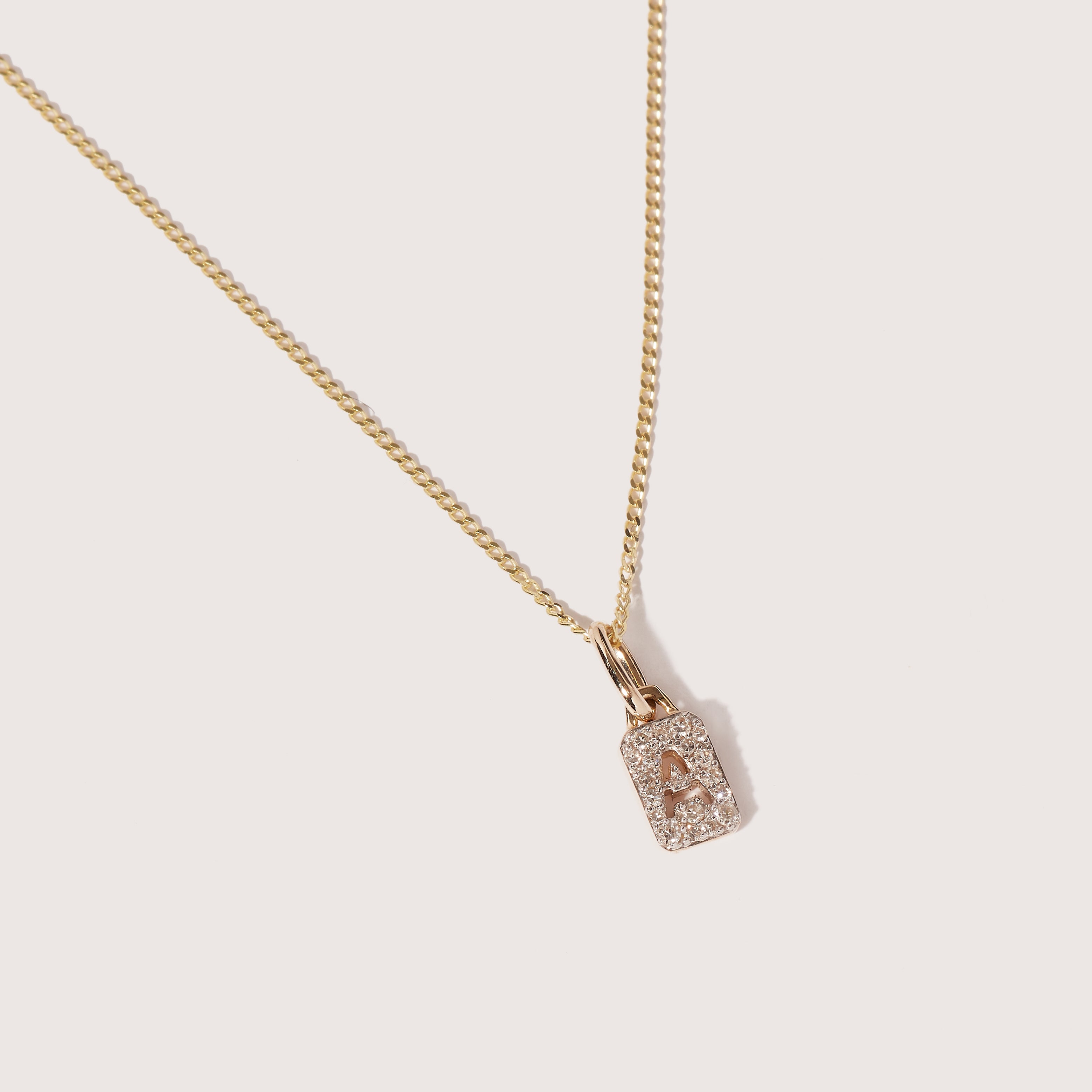 Tiny Diamond Initial Tag Pendant