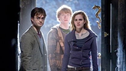 DANIEL RADCLIFFE as Harry Potter, RUPERT GRINT as Ron Weasley and EMMA WATSON as Hermione Granger in Warner Bros. PicturesÕ fantasy adventure ÒHARRY POTTER AND THE DEATHLY HALLOWS Ð PART 1,Ó a Warner Bros. Pictures release