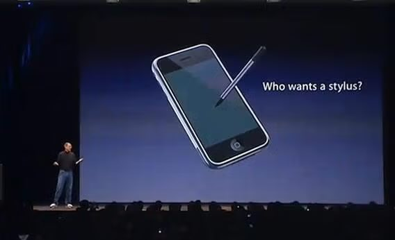 Steve Jobs on stage announcing the original iPhone