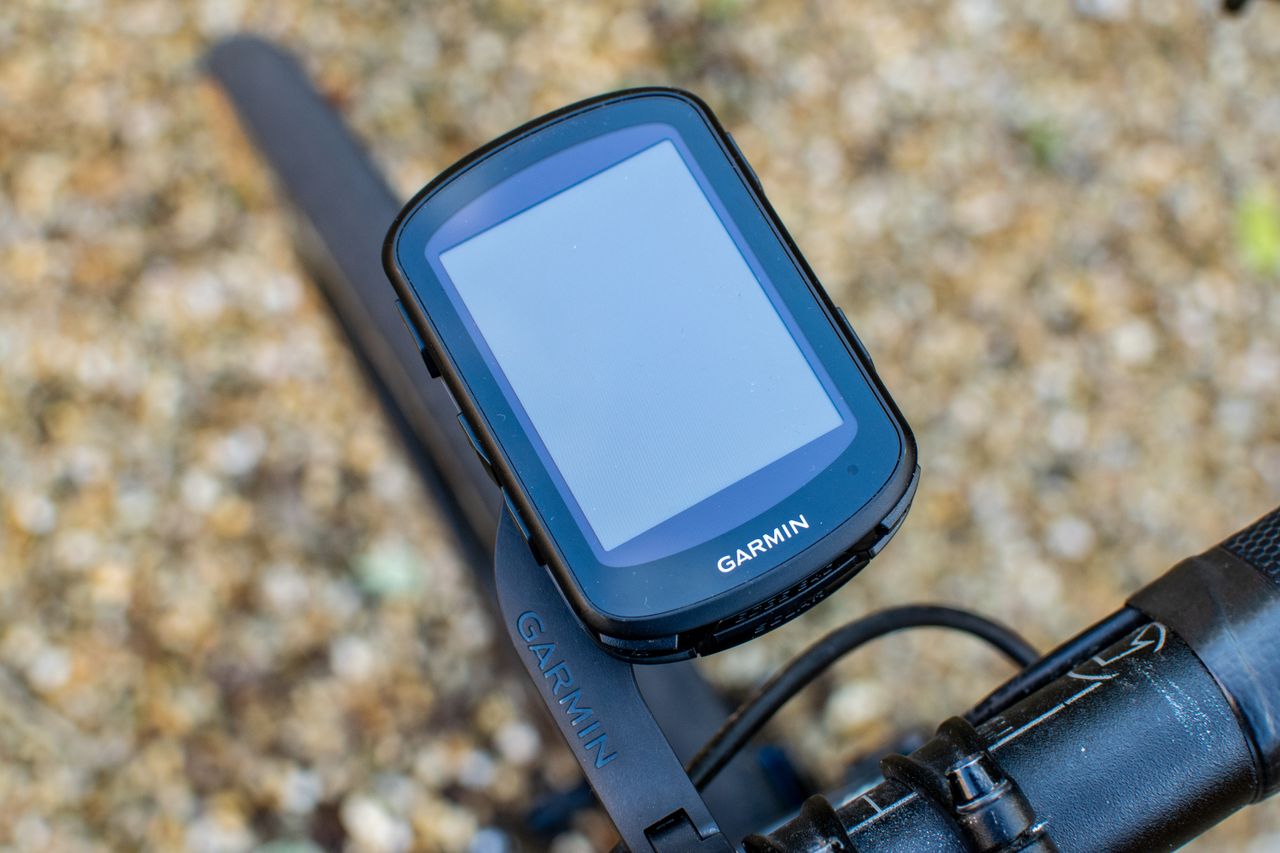A Garmin Edge 840 computer mounted to a bike