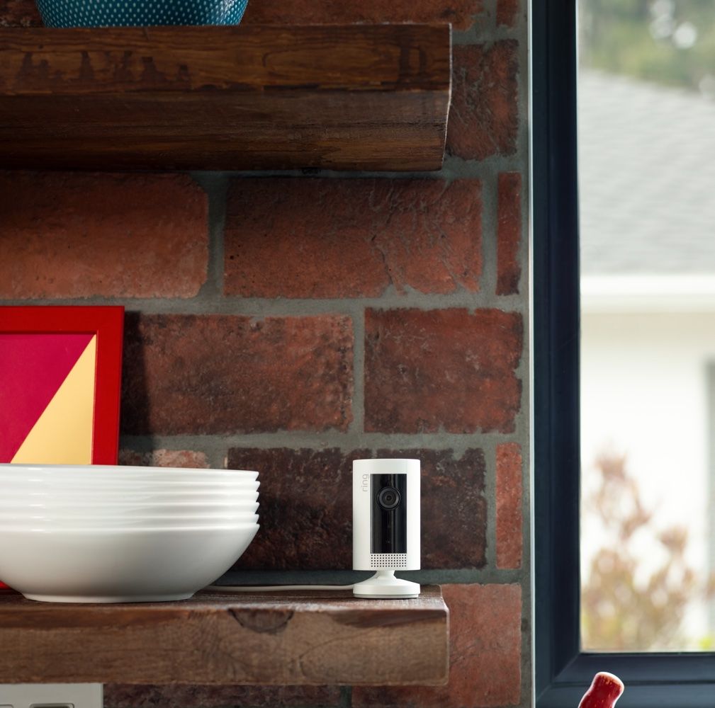 ring camera with brick wall and plates