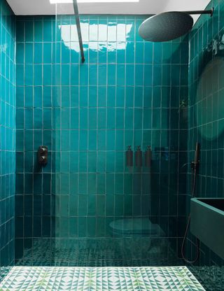Small shower room with glazed blue tiles