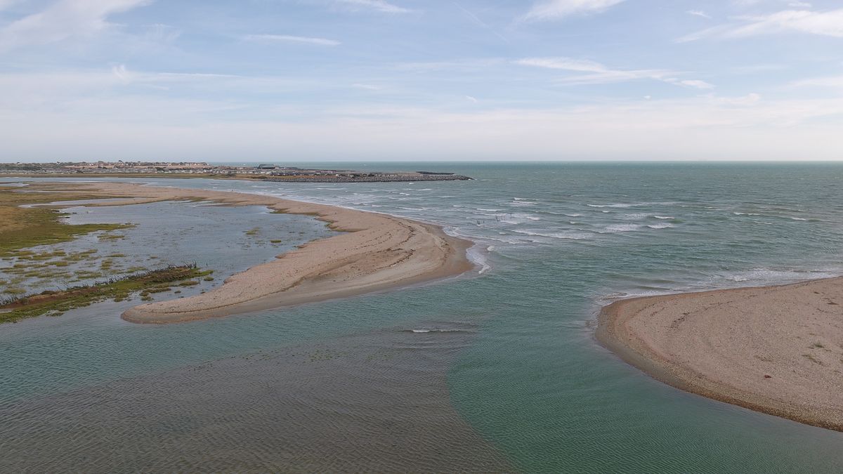Aerial views of the South Coast of the UK on a cloudy day from a drone
