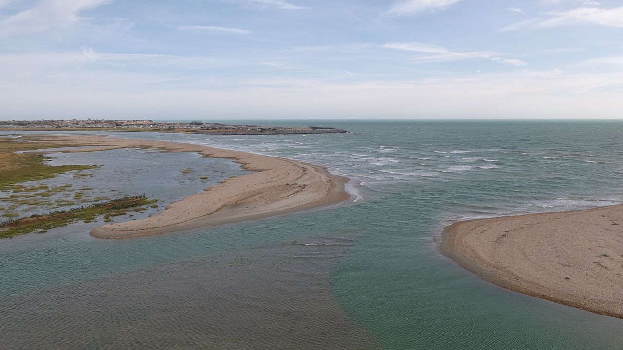 Aerial views of the South Coast of the UK on a cloudy day from a drone