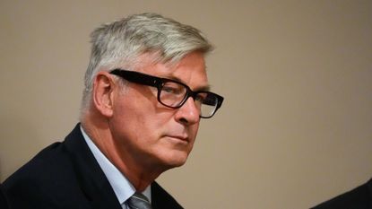 Alec Baldwin listens to testimony during a pre-trial hearing at the First Judicial District Courthouse on 8 July 2024 in Santa Fe, New Mexico