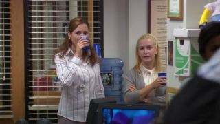 Pam and Angela drinking water by the water cooler