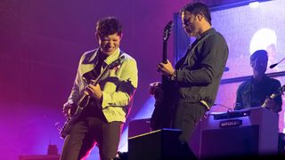 Kings of Leon&#039;s Matthew Followill and Caleb Followill playing live in 2022