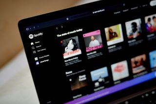 Spotify homepage on a laptop screen