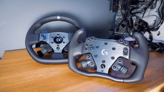 The Logitech G RS Wheel Hub and RS Track Wheel on a desk and installed on a sim racing wheel base.