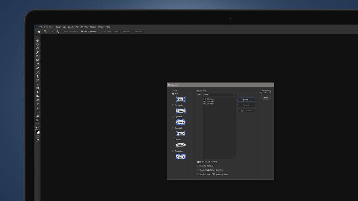 A laptop screen showing a vertical panorama photo being made in Photoshop