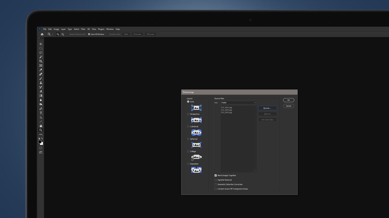 A laptop screen showing a vertical panorama photo being made in Photoshop