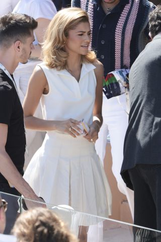 Zendaya wears a custom white tennis set from On at a Monaco press event