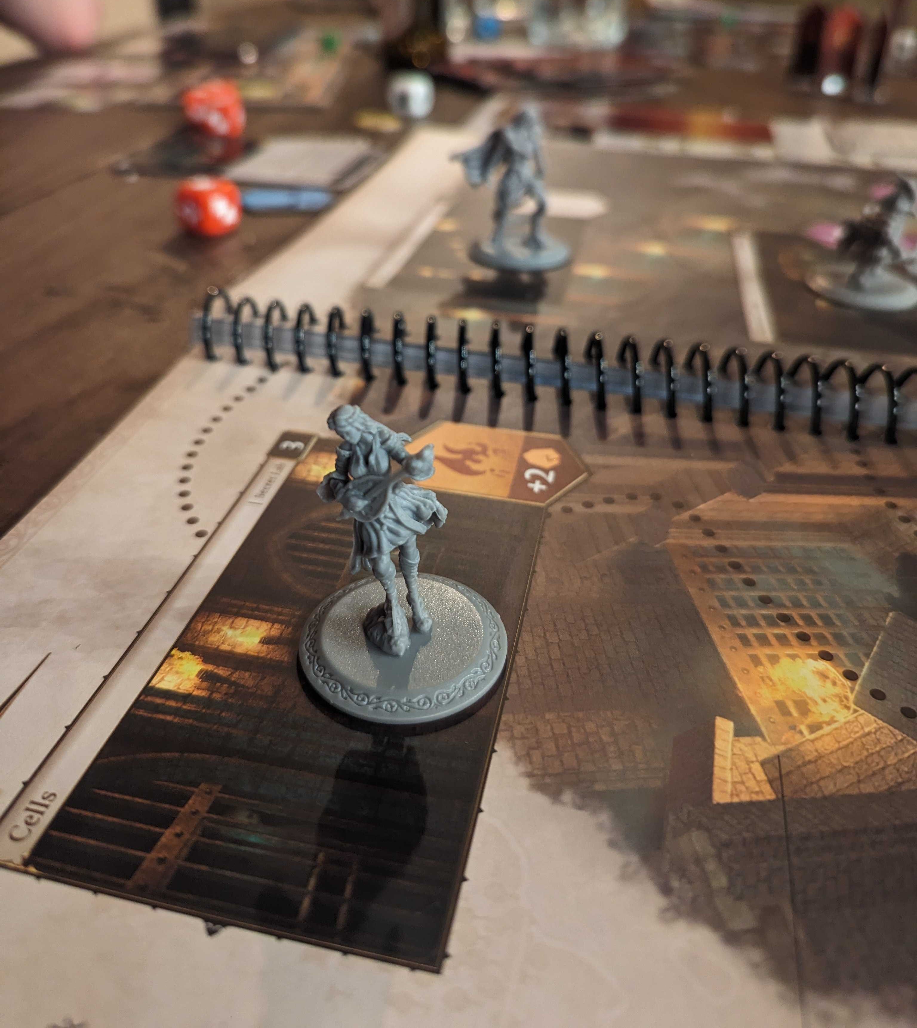 A close up of the miniature of Lohse in the Divinity: Original Sin board game.