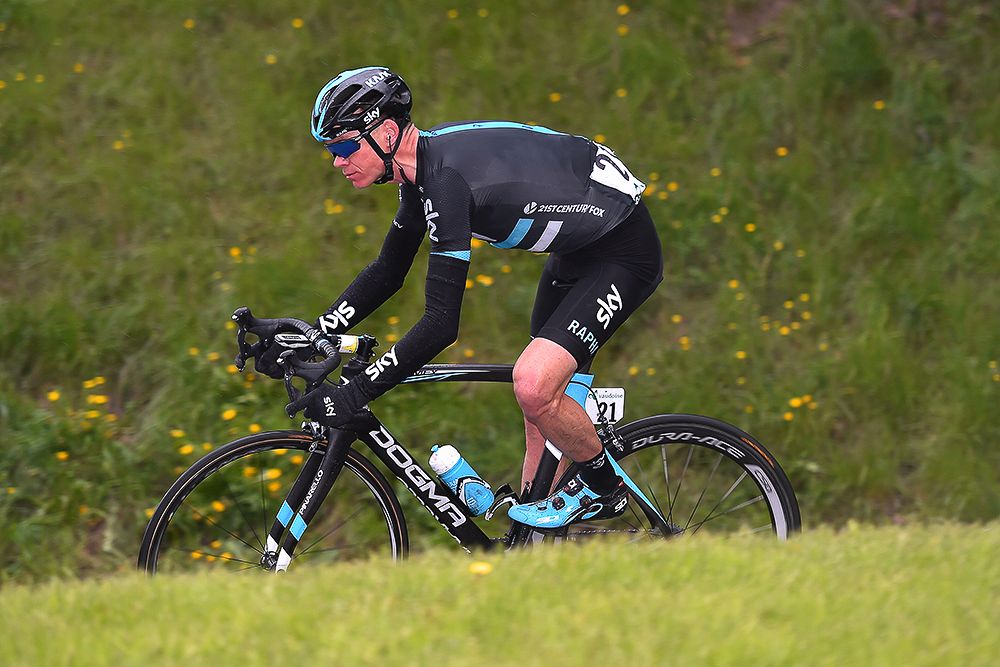 Chris Froome takes a corner during stage 4 at Tour de Romandie
