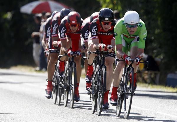 Clad in green, Cadel Evans takes a turn at the front of the BMC train.
