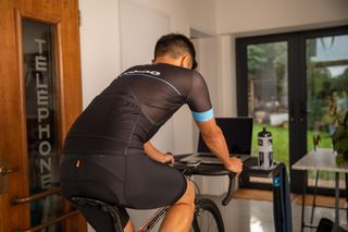 Image shows a rider doing a cycling workout