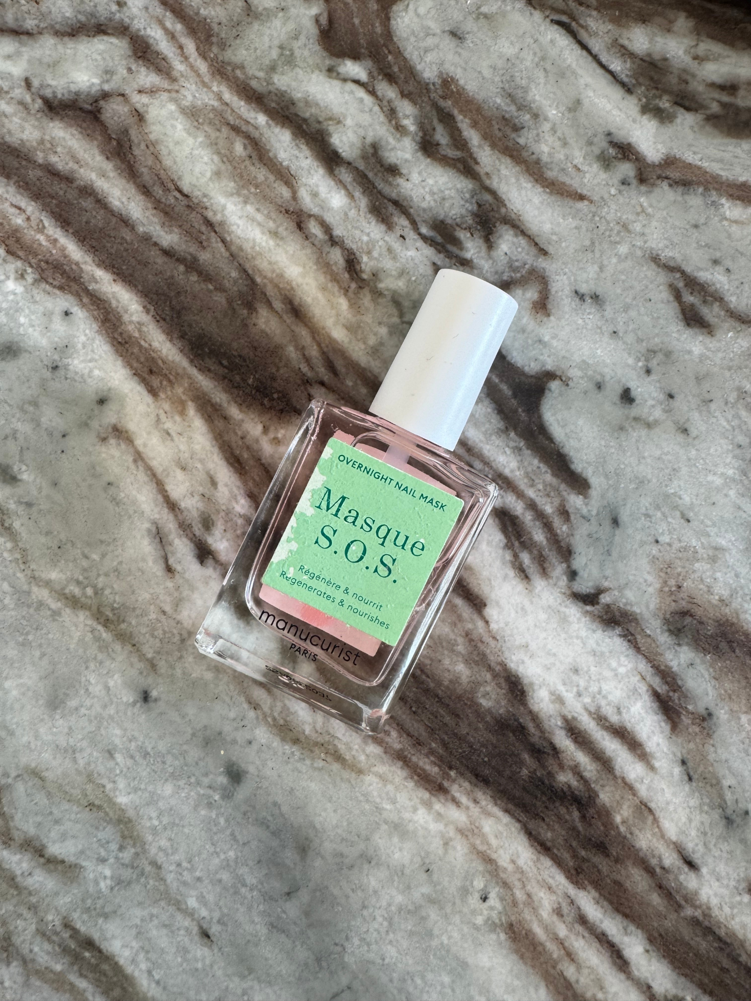 A bottle of Manucurist Masque SOS
