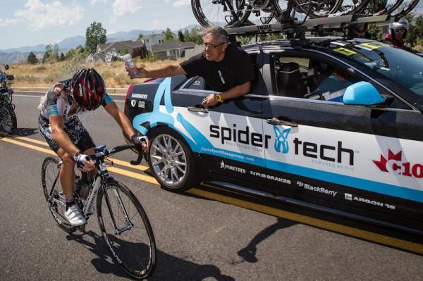 Caleb Farley (Spidertech) gets support from the team car after a bad crash