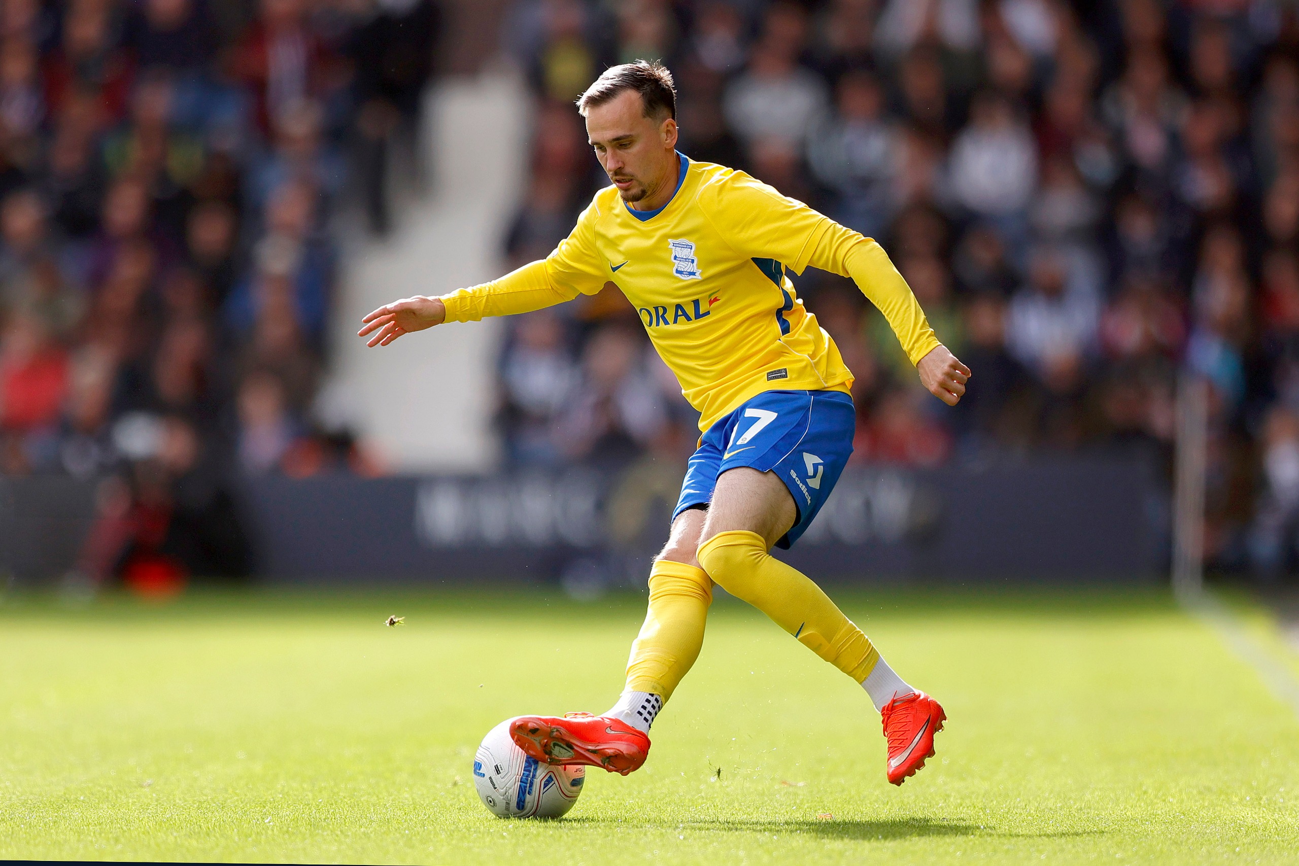 Birmingham City winger Liam Millar controlling the ball during an away match against West Bromwich Albion