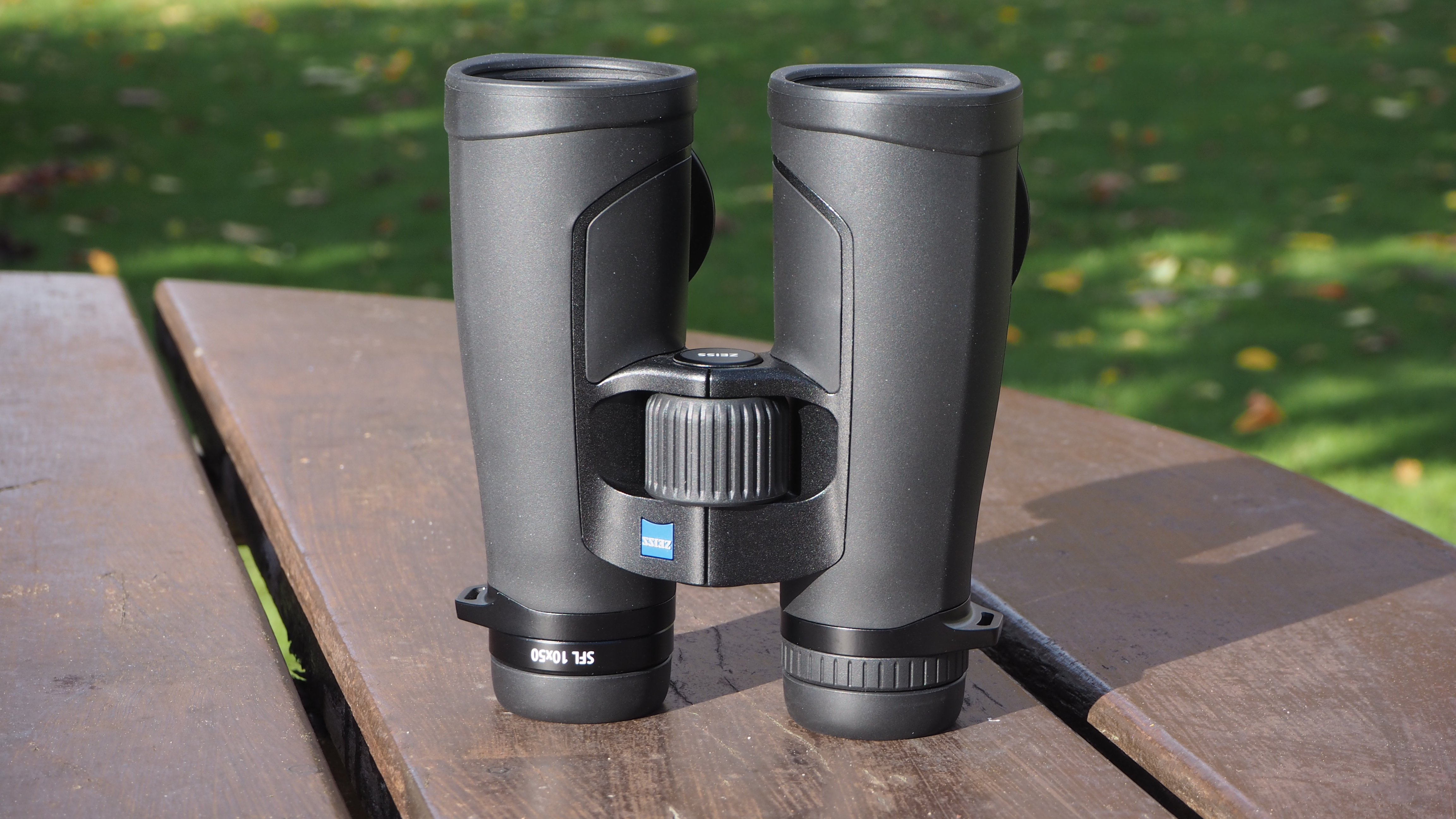 Zeiss SFL 10x50 binoculars on a table