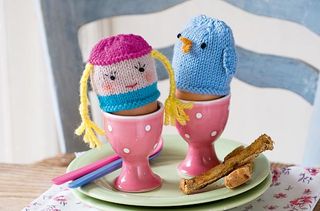 Blonde Girl and Bluebird knitted egg cosy