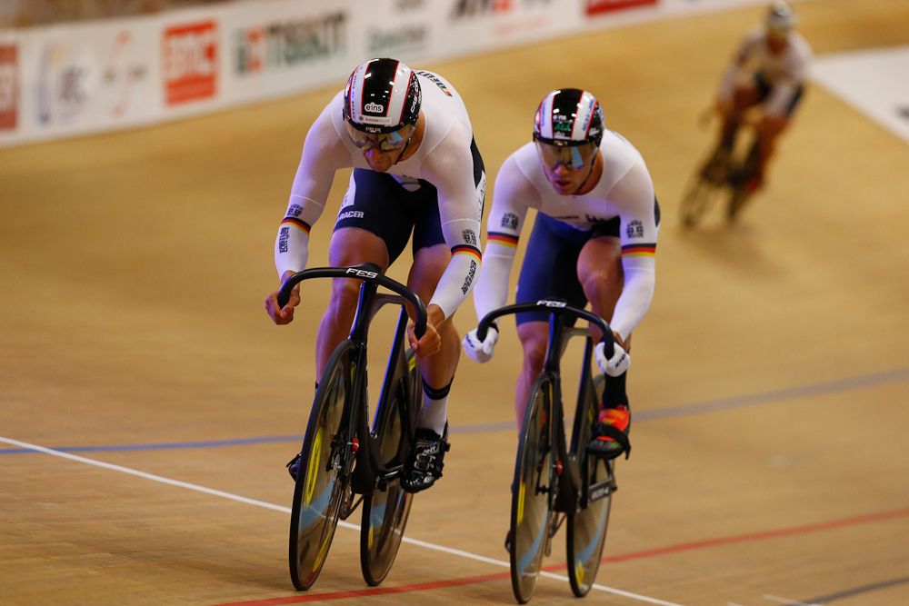German team sprinters push for the line.