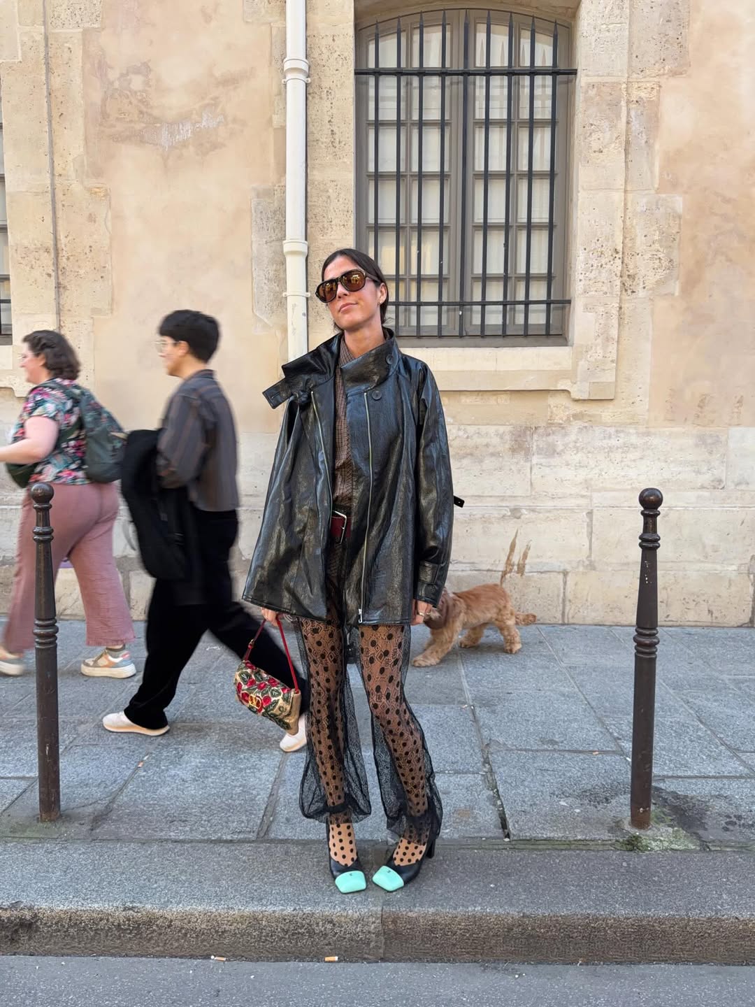 @vicmontanari wears black leather jacket, chanel heels