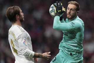 Atletico Madrid keeper Jan Oblak, right, was a key performer in the goalless draw with Real