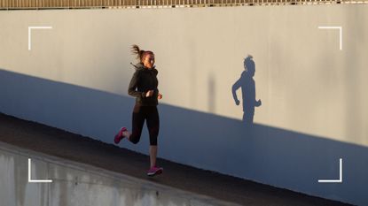 Woman in activewear running down a concrete slope early in the morning after learning the best time to exercise