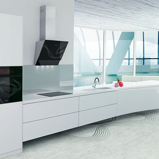 contemporary kitchen with sleek unit and fan extractor