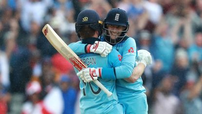 Eoin Morgan and Joe Root celebrate victory in the Cricket World Cup semi final