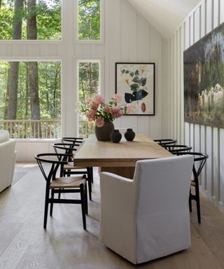 white large modern farmhouse dining room with mis matched chairs
