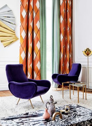 Chairs in Rivoli Violette fabric by Manuel Canovas