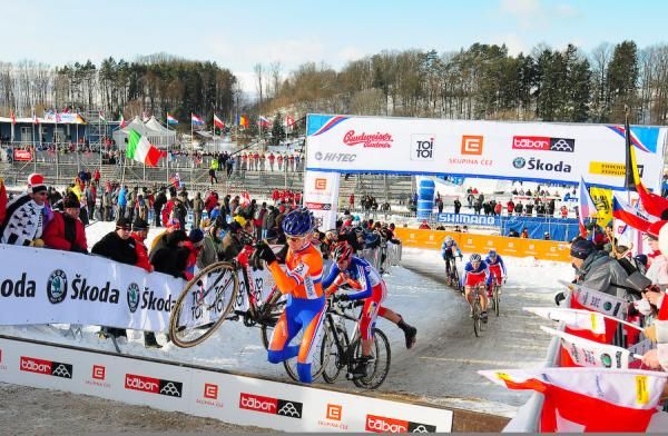 Gert-Jan Bosman (Netherlands) leads many of the French team over the hurdles in the early laps