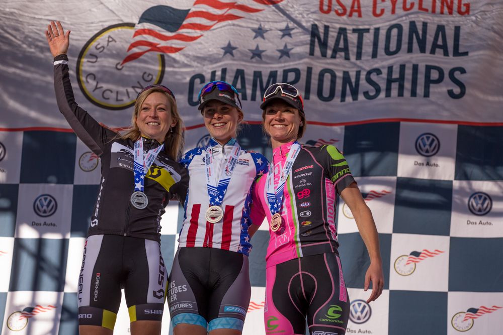 The women's pro podium of winner Chloe Woodruff, flanked by Erin Huck and Rose Grant.