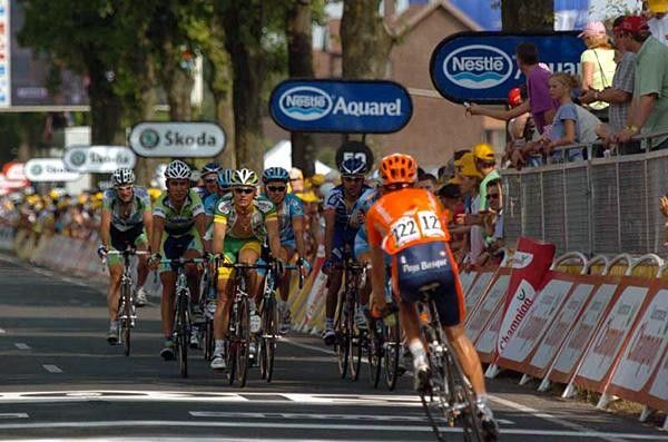 Iker Camano (Euskaltel) meets a group of finishers