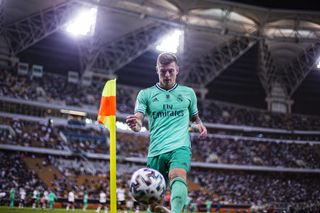 Toni Kroos prepares to take a corner for Real Madrid against Valencia in the Spanish Supercopa in January 2020.