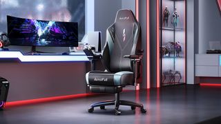 Autofull M6 Gaming Chair in front of a desk